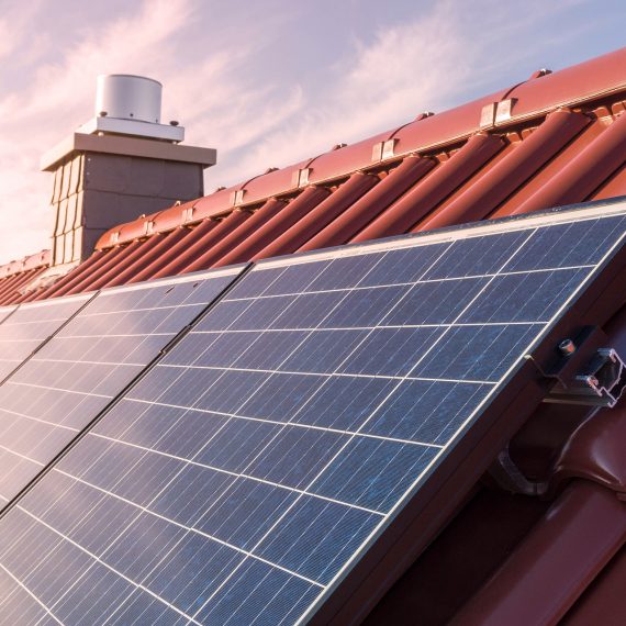 solar panesl or photovoltaic plant on the roof of a house